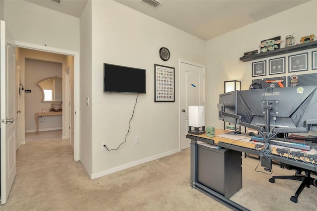 home office featuring light colored carpet