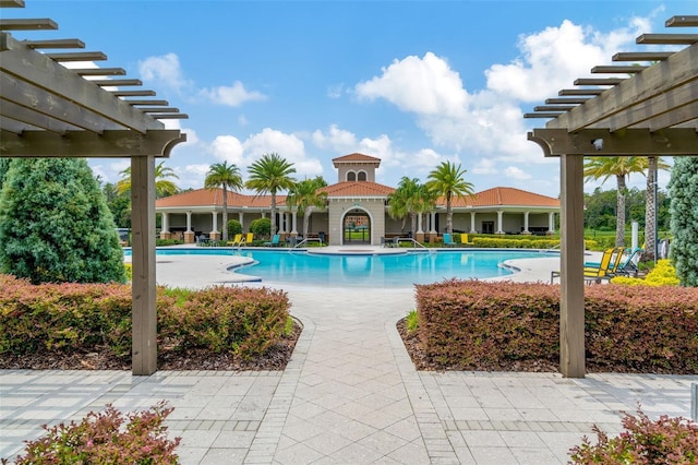 view of swimming pool with a pergola