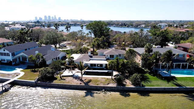 birds eye view of property featuring a water view