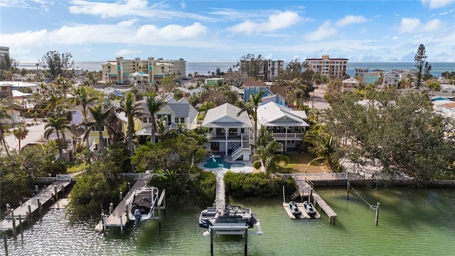 bird's eye view with a water view