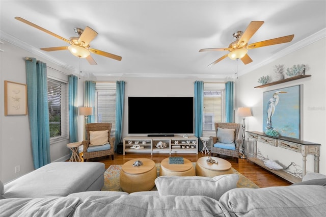 living room with crown molding, ceiling fan, and wood-type flooring