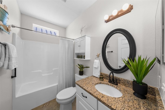 full bathroom with vanity, toilet, and shower / tub combo with curtain