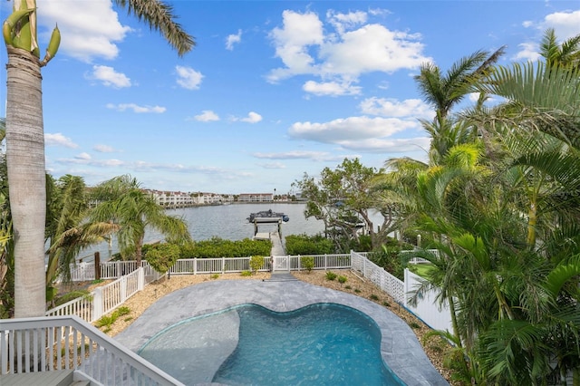 view of pool with a water view