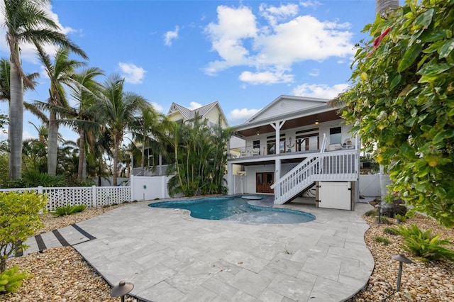 view of swimming pool with a patio area