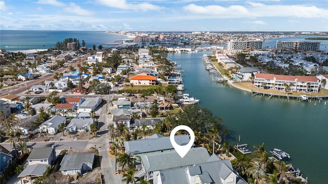 drone / aerial view with a water view