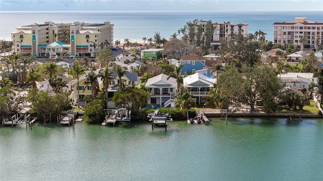 bird's eye view with a water view