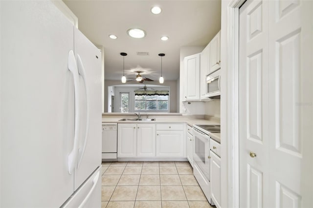 kitchen with white cabinetry, sink, ceiling fan, and white appliances