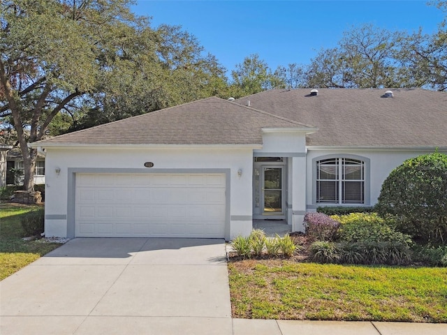 single story home featuring a garage