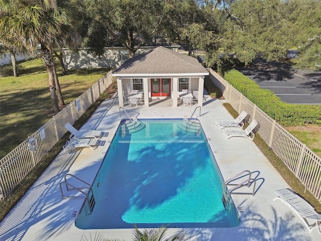 view of swimming pool with a patio area