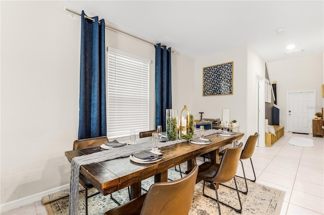 dining room featuring light tile patterned floors