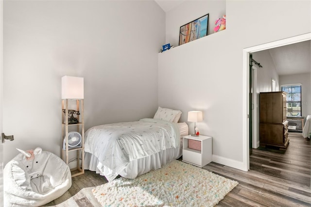 bedroom featuring wood-type flooring