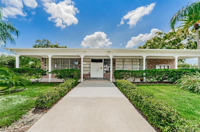 view of front of home with a front yard