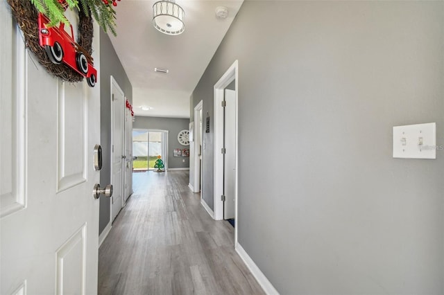 hall featuring light hardwood / wood-style flooring