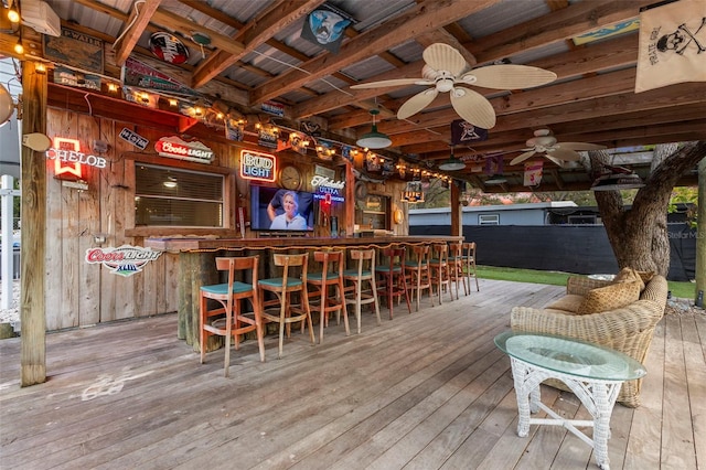 wooden terrace featuring an outdoor bar