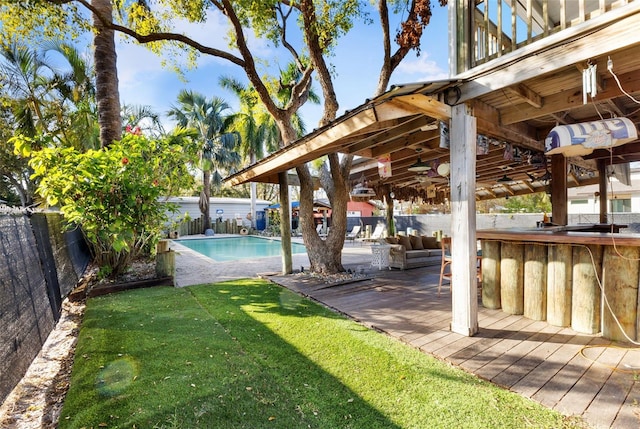 view of yard featuring a fenced in pool and a patio area