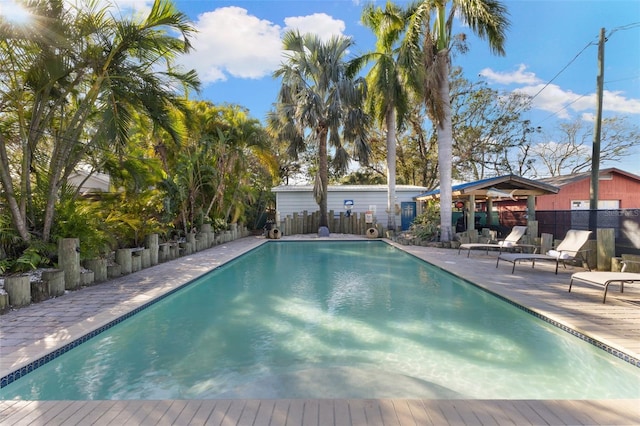 view of swimming pool featuring a patio area