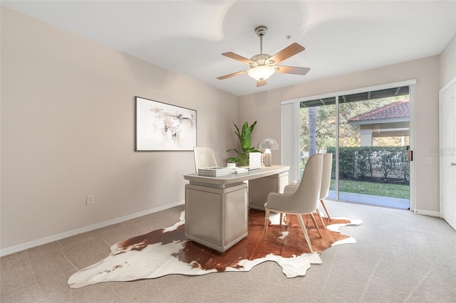 home office featuring ceiling fan and carpet flooring