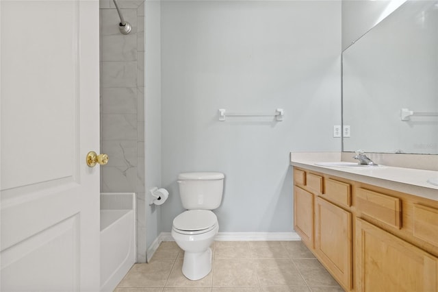 bathroom with vanity, tile patterned flooring, and toilet