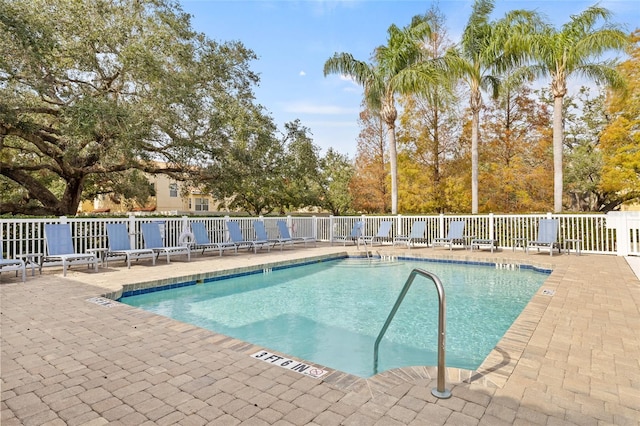 view of pool featuring a patio area