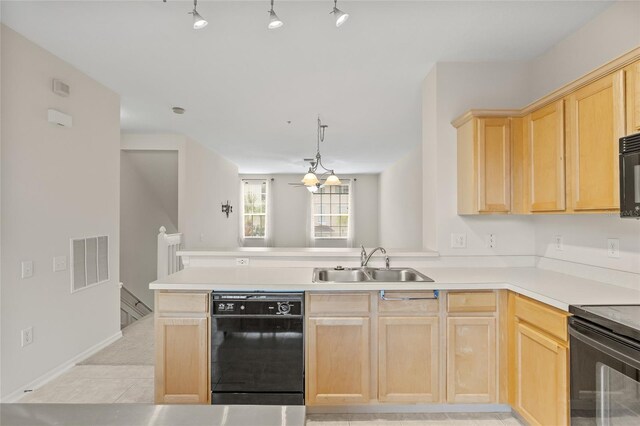 kitchen with light brown cabinetry, sink, kitchen peninsula, and black appliances