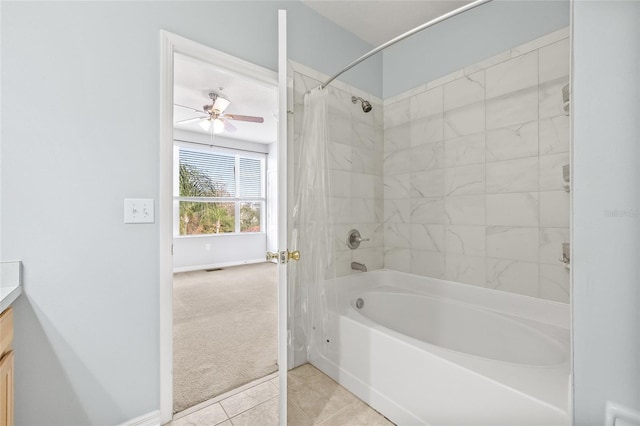 bathroom with vanity, shower / tub combo, tile patterned flooring, and ceiling fan