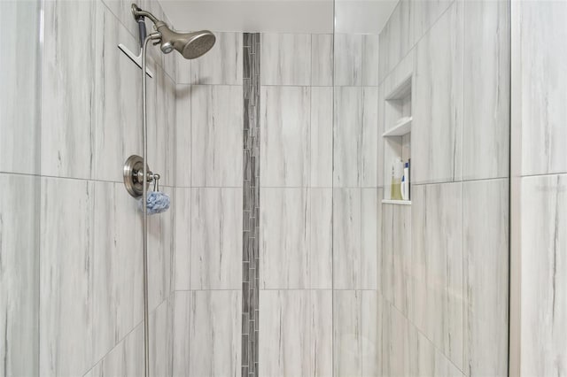 details with a tile shower