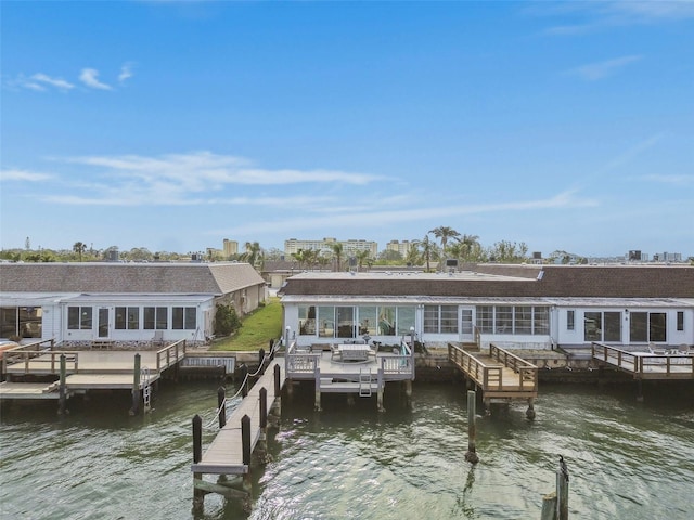 view of dock with a water view