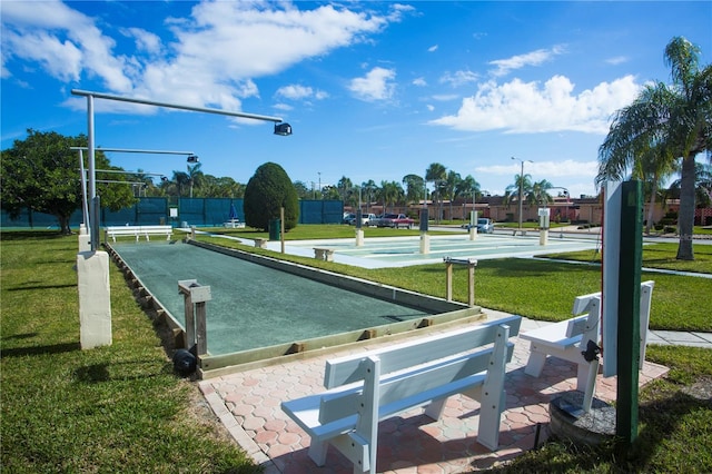 view of home's community featuring a yard