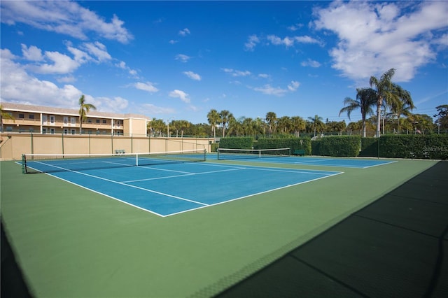 view of sport court featuring basketball hoop