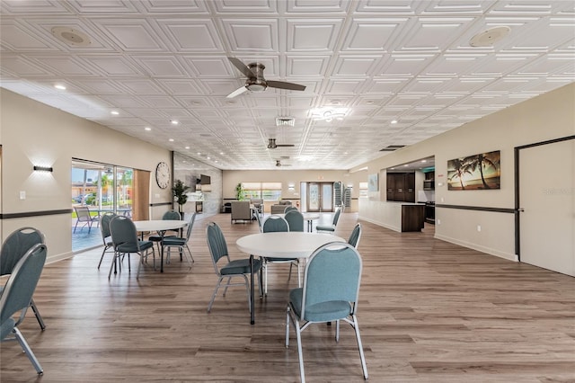 dining room featuring hardwood / wood-style floors and ceiling fan