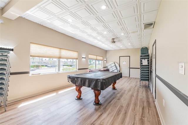 game room with light wood-type flooring and pool table