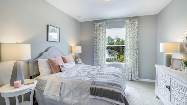 bedroom with light carpet