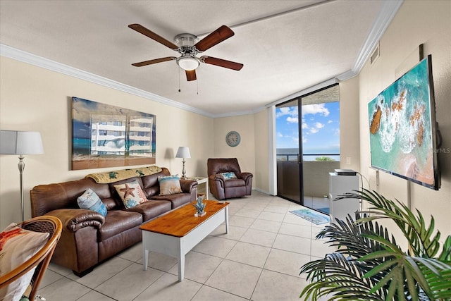 tiled living room featuring a textured ceiling, floor to ceiling windows, crown molding, and ceiling fan