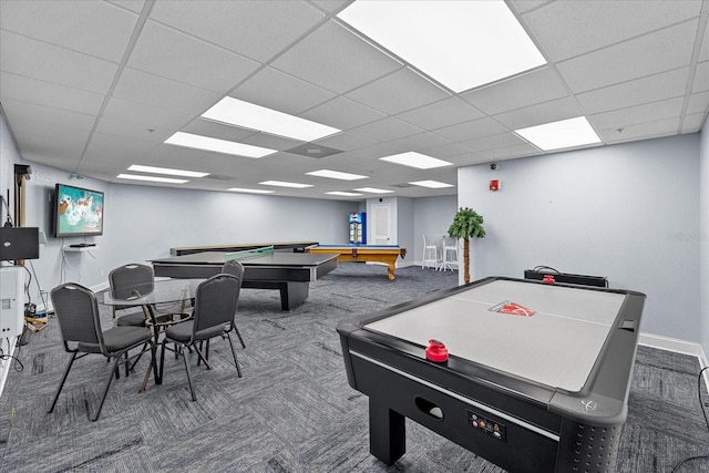 rec room featuring a paneled ceiling, dark carpet, and billiards