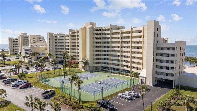 view of building exterior with a water view