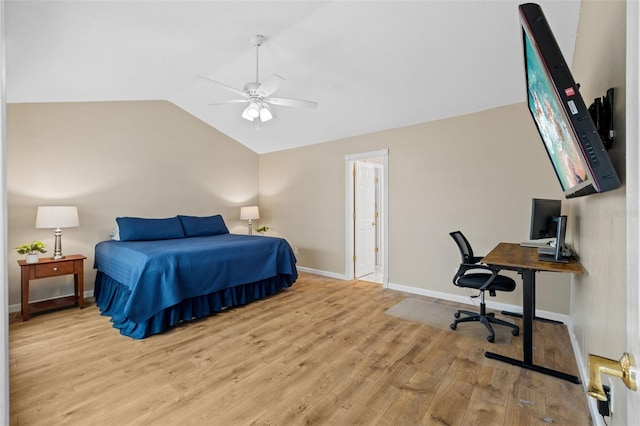 bedroom featuring lofted ceiling, ceiling fan, and light hardwood / wood-style floors