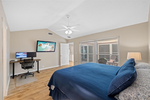 bedroom with ceiling fan, vaulted ceiling, and light wood-type flooring