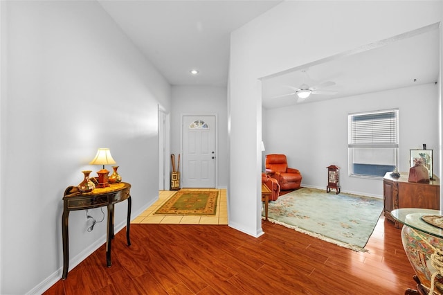 foyer featuring hardwood / wood-style flooring and ceiling fan