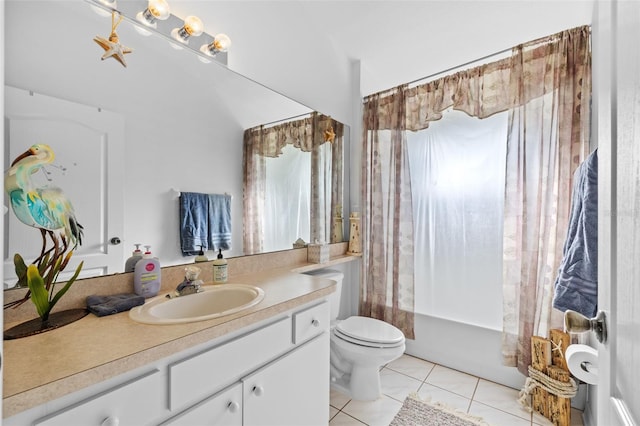 full bathroom featuring toilet, shower / bath combination with curtain, vanity, and tile patterned floors