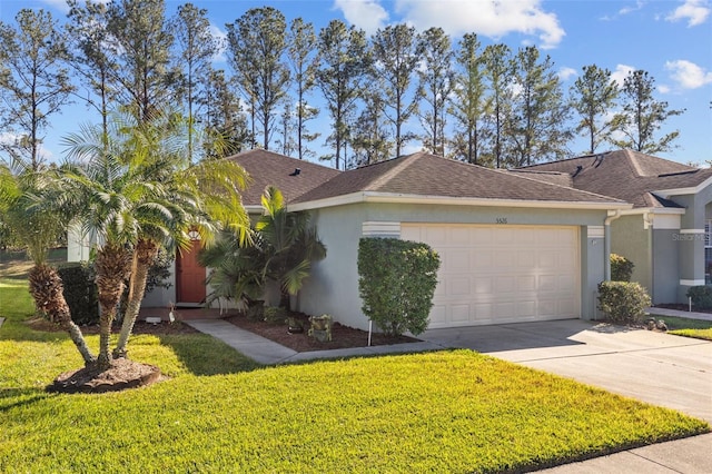 ranch-style house featuring a front yard and a garage