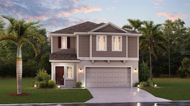 view of property with a yard and a garage