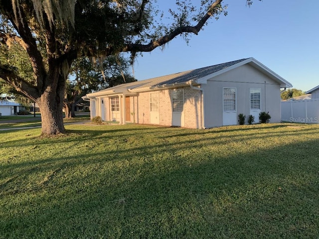 exterior space featuring a front yard