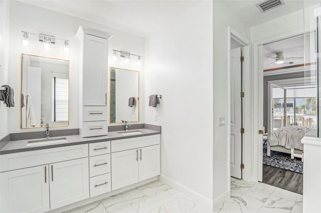 bathroom with vanity and ceiling fan