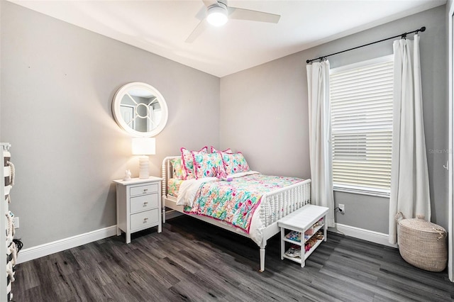 bedroom featuring dark hardwood / wood-style floors and ceiling fan