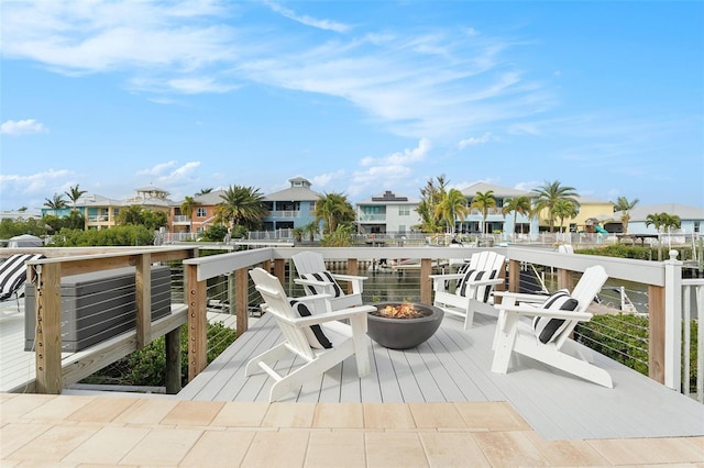 view of patio / terrace with a fire pit