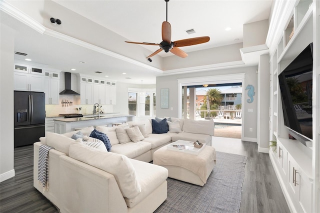 6408 Key Island Ave, Apollo Beach, FL 33572 - living area with baseboards, visible vents, ceiling fan, and dark wood-style flooring