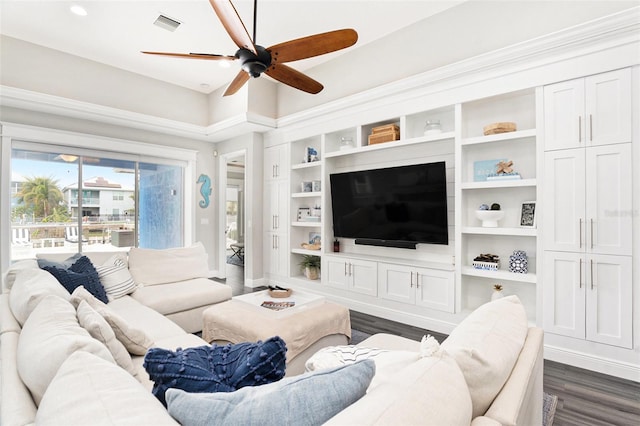 6408 Key Island Ave, Apollo Beach, FL 33572 - living room with dark wood-style floors, ceiling fan, built in features, baseboards, and visible vents