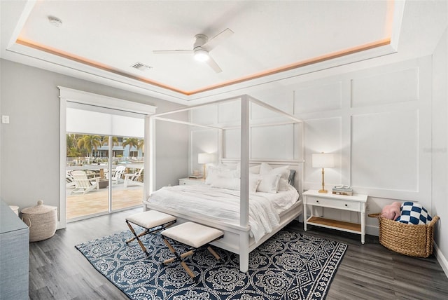 6408 Key Island Ave, Apollo Beach, FL 33572 - bedroom with visible vents, wood finished floors, access to outside, and ceiling fan