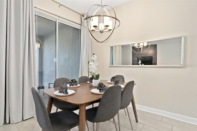 tiled dining space with a notable chandelier