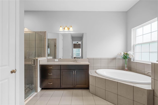 bathroom featuring vanity, tile patterned floors, and independent shower and bath